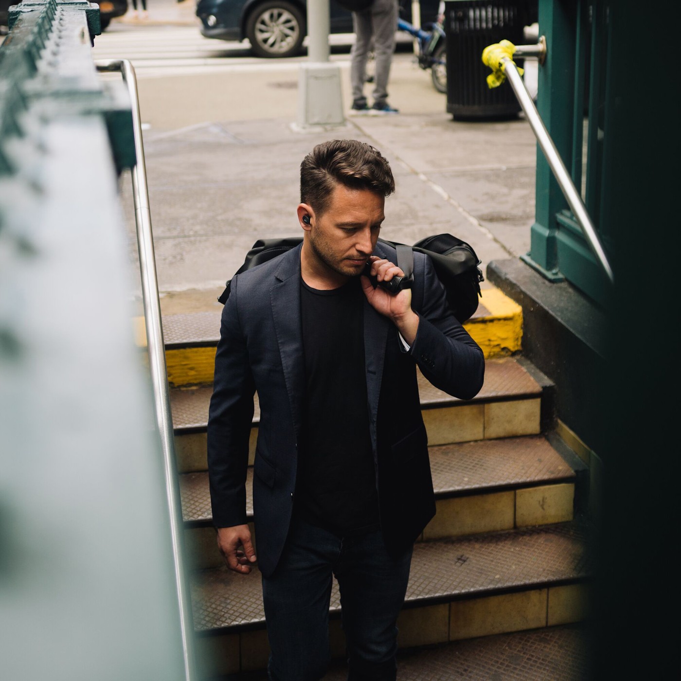 Klipsch T5 II ANC earphones man going to subway 1