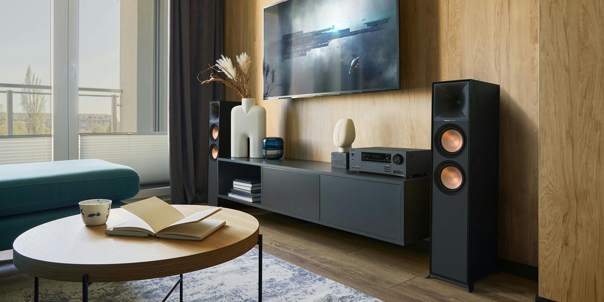 Onkyo TX SR3100 DAB AVR and Klipsch R 600 F speakers in modern living room against wood wall 2000x1000